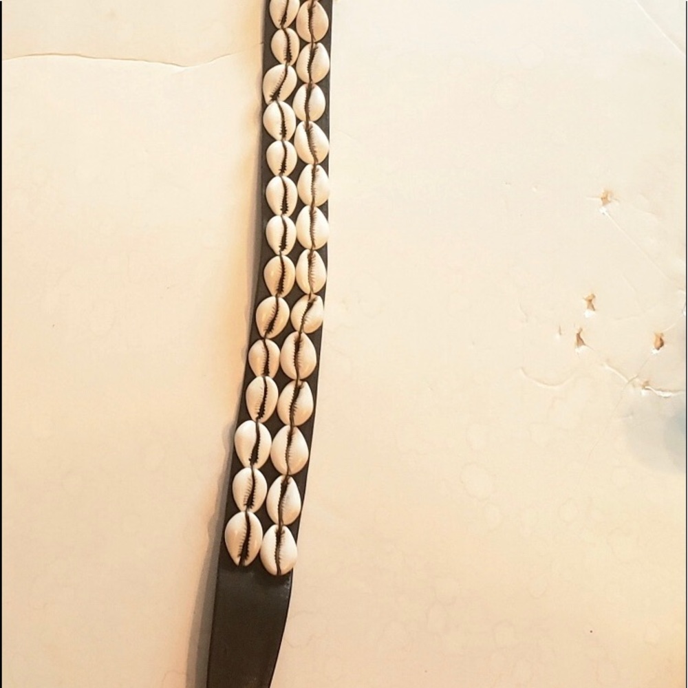 Two stand cowrie shell and leather belt 32”